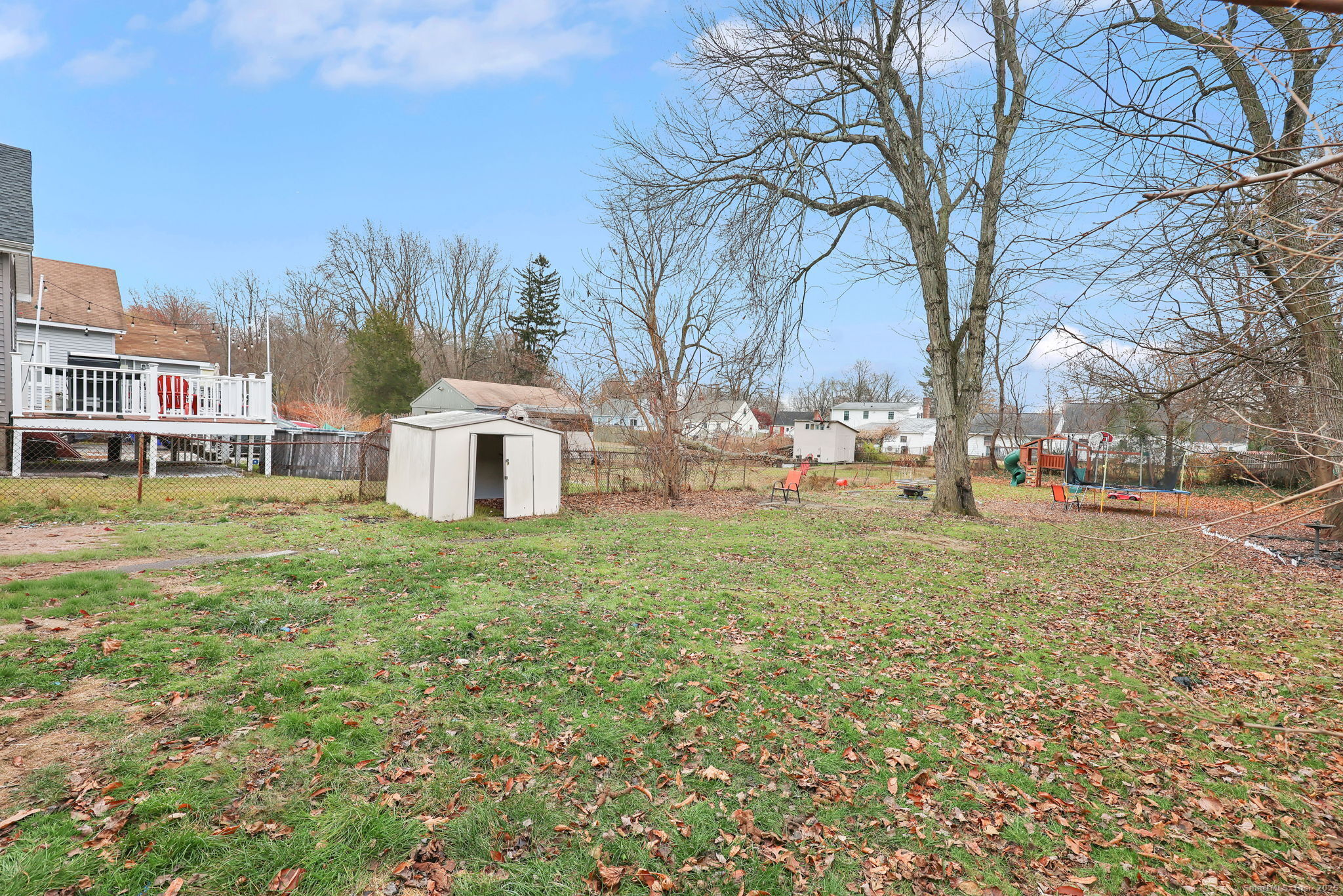 16 Brainard Road Enfield, CT 06082 - Photo 28 of 28 a view of a yard with a house in the background