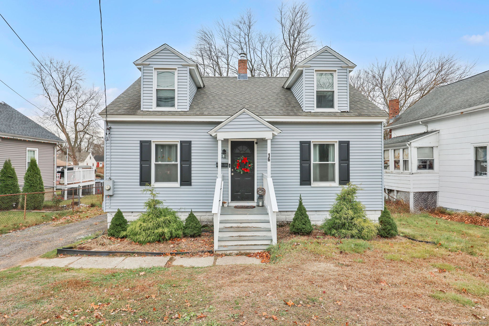 16 Brainard Road Enfield, CT 06082 - Photo 4 of 28 a front view of a house with a yard