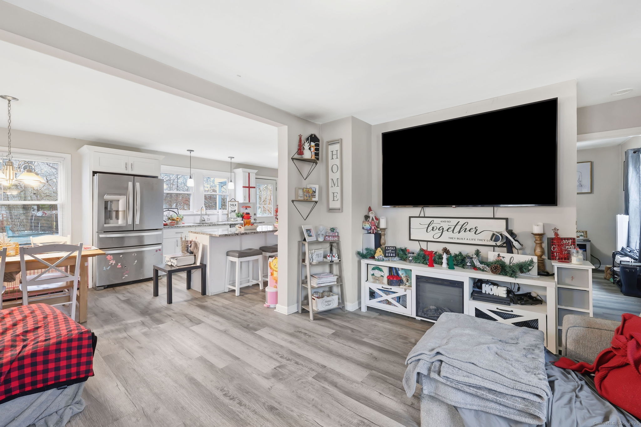 16 Brainard Road Enfield, CT 06082 - Photo 7 of 28 a living room with furniture and a flat screen tv