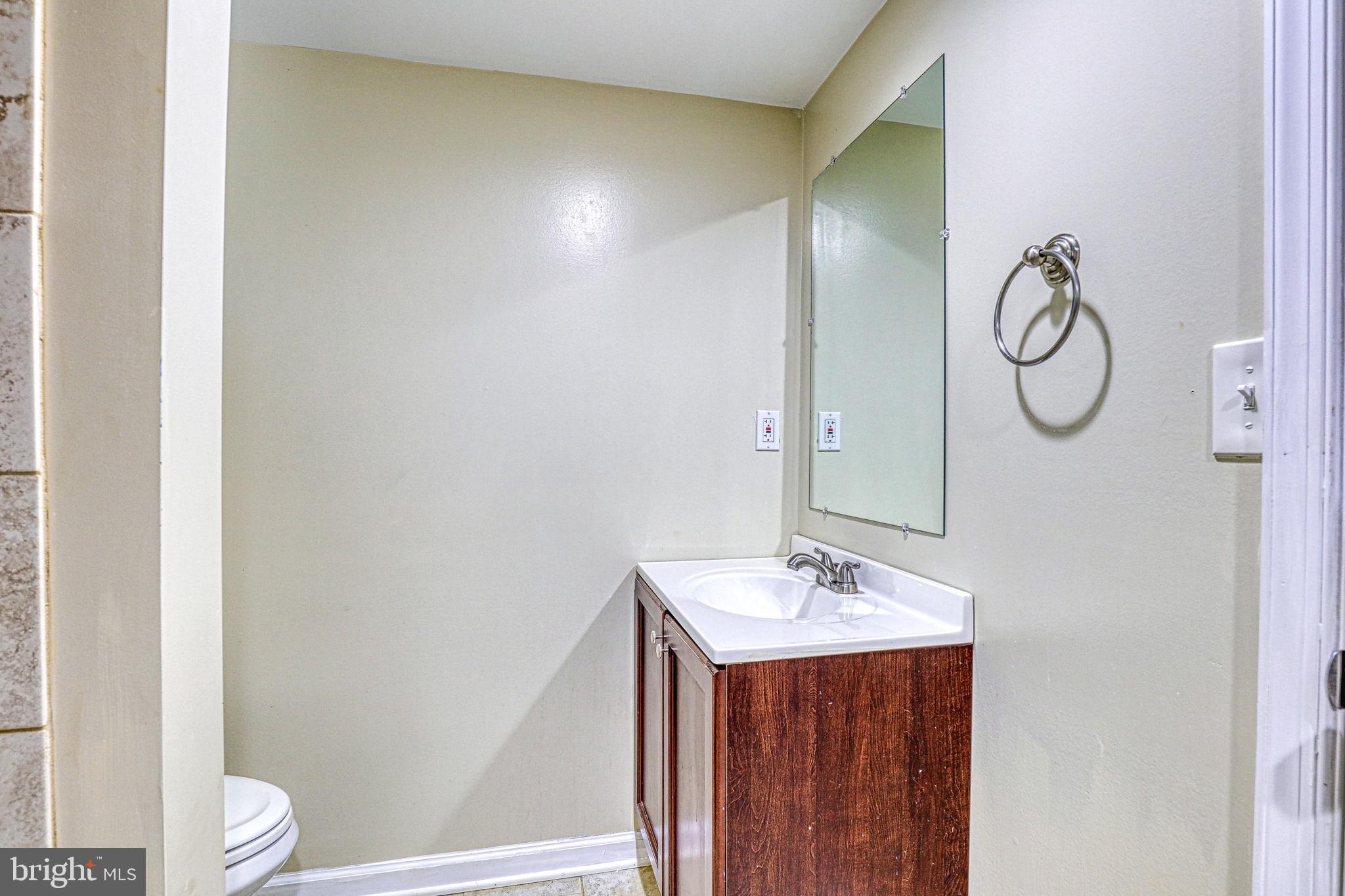 7813 E Road Pasadena, MD 21122 - Photo 27 of 31 Lower Level Bath (Full Bath #2)