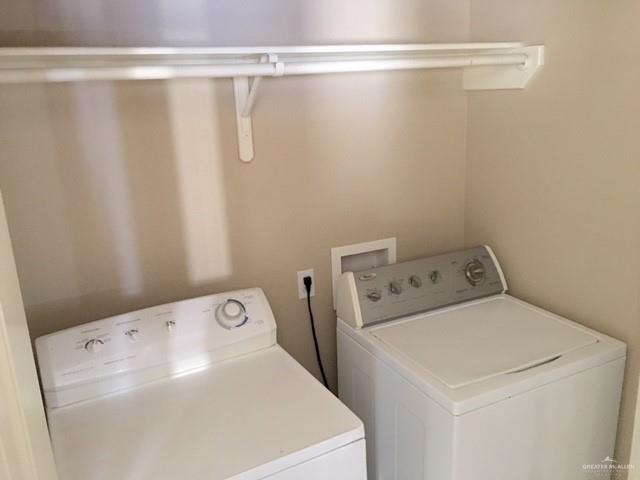 1504 East Quail Street Pharr, TX 78577 - Photo 12 of 12 a utility room with dryer and washer