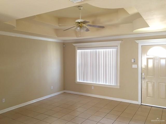 1504 East Quail Street Pharr, TX 78577 - Photo 2 of 12 a view of an empty room with a window