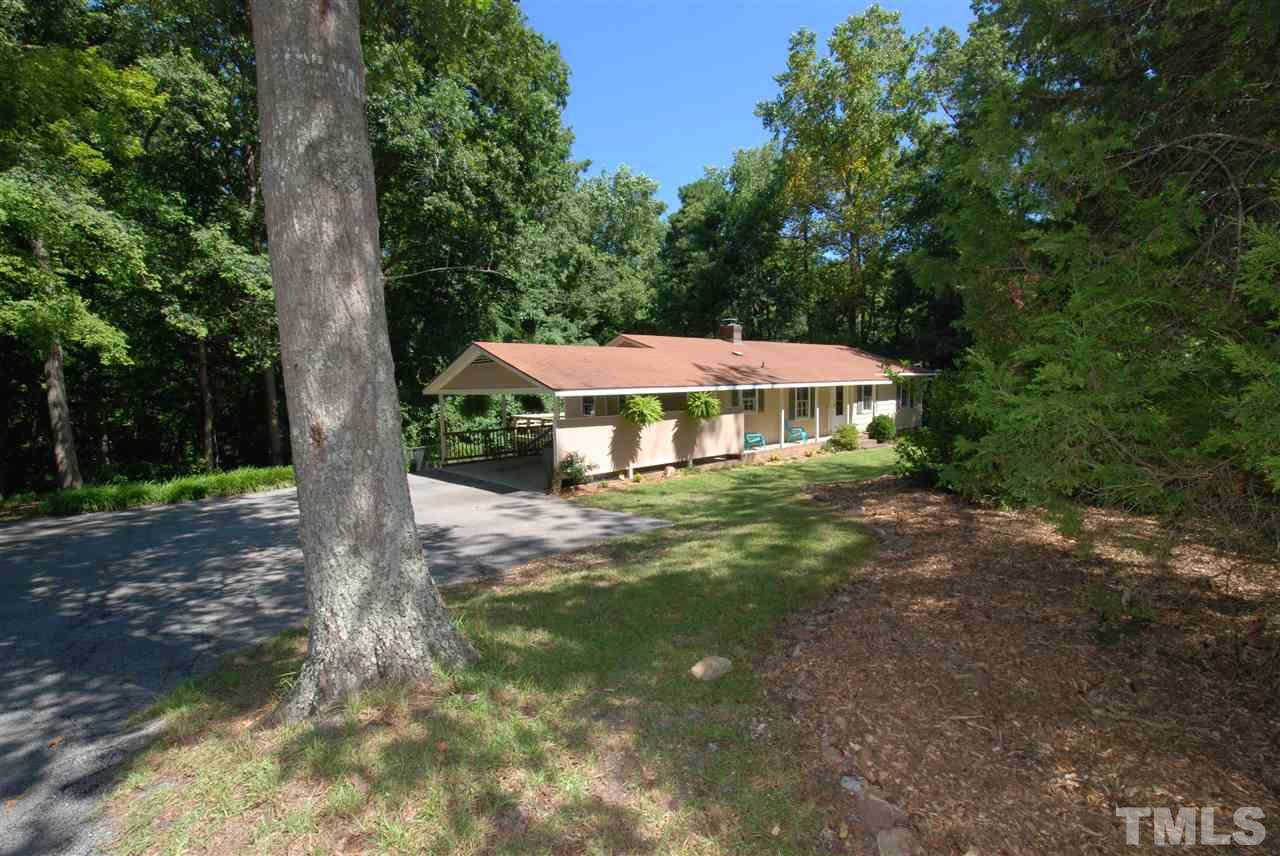 6908 Lake Wheeler Road Raleigh, NC 27603 - Photo 3 of 25 a view of a small yard with a small yard and swimming pool