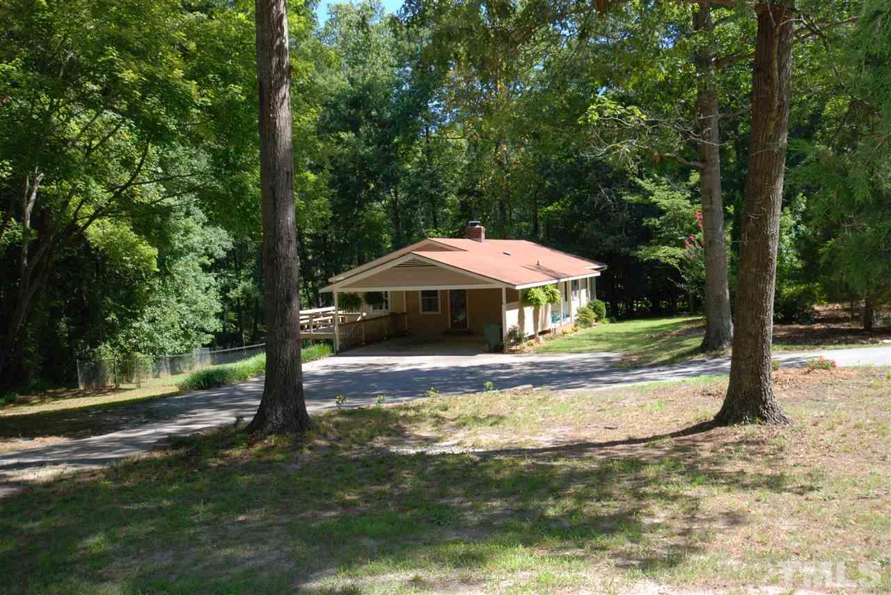 6908 Lake Wheeler Road Raleigh, NC 27603 - Photo 25 of 25 a view of a house with a yard