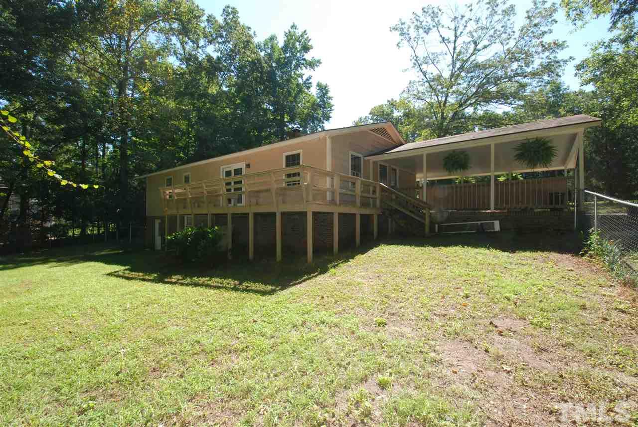 6908 Lake Wheeler Road Raleigh, NC 27603 - Photo 4 of 25 a view of a house with a yard