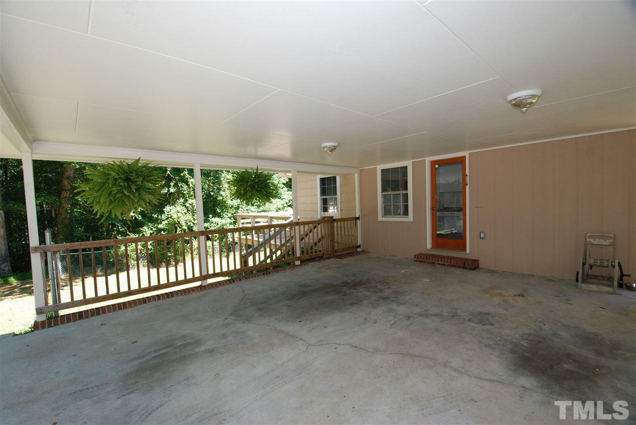 6908 Lake Wheeler Road Raleigh, NC 27603 - Photo 8 of 25 a view of a big room with wooden floor and balcony