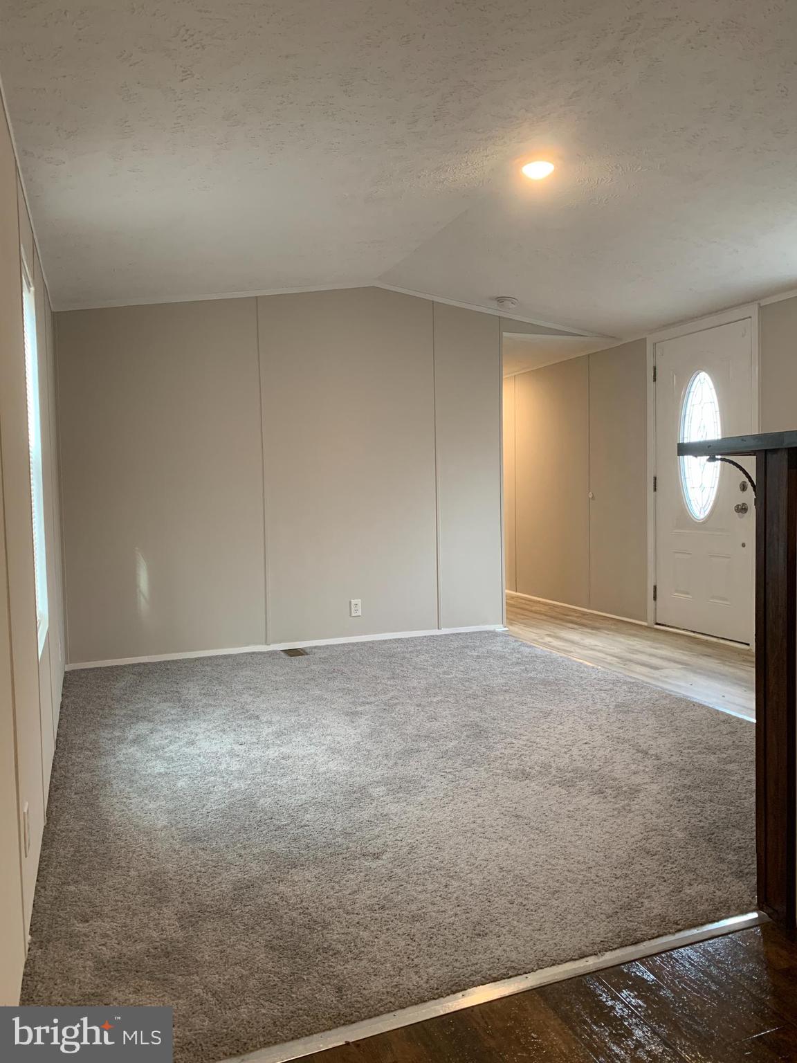 7806 Clark Road, Unit D50 Jessup, MD 20794 - Photo 14 of 37 Spacious living room with new carpet
