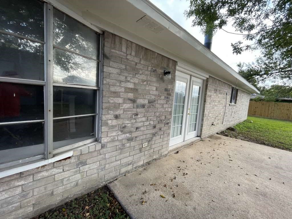 2310 Heather Street Highlands, TX 77562 - Photo 14 of 16 a view of entrance gate of a house
