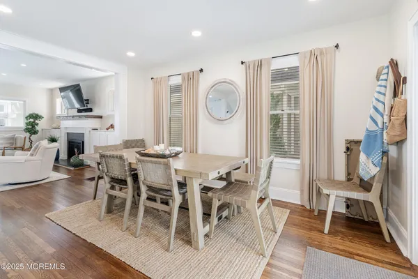 a bedroom with a bed and a view of kitchen