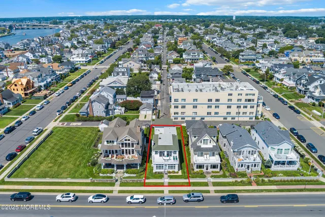 a view of a city with a ocean view