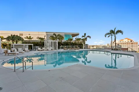 a view of a swimming pool with a garden