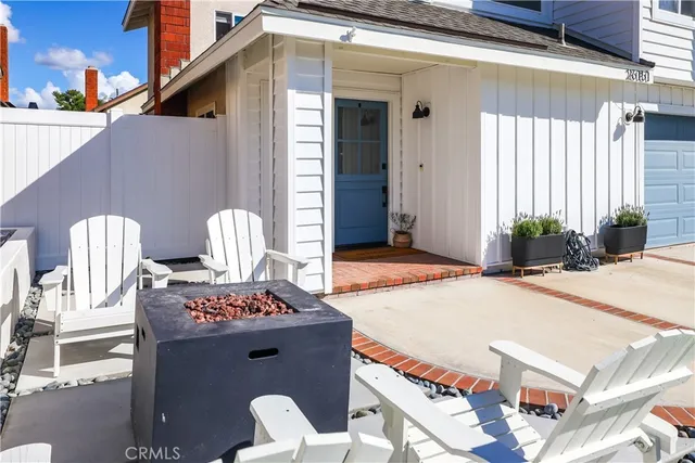 a spacious bathroom with a granite countertop sink and a mirror