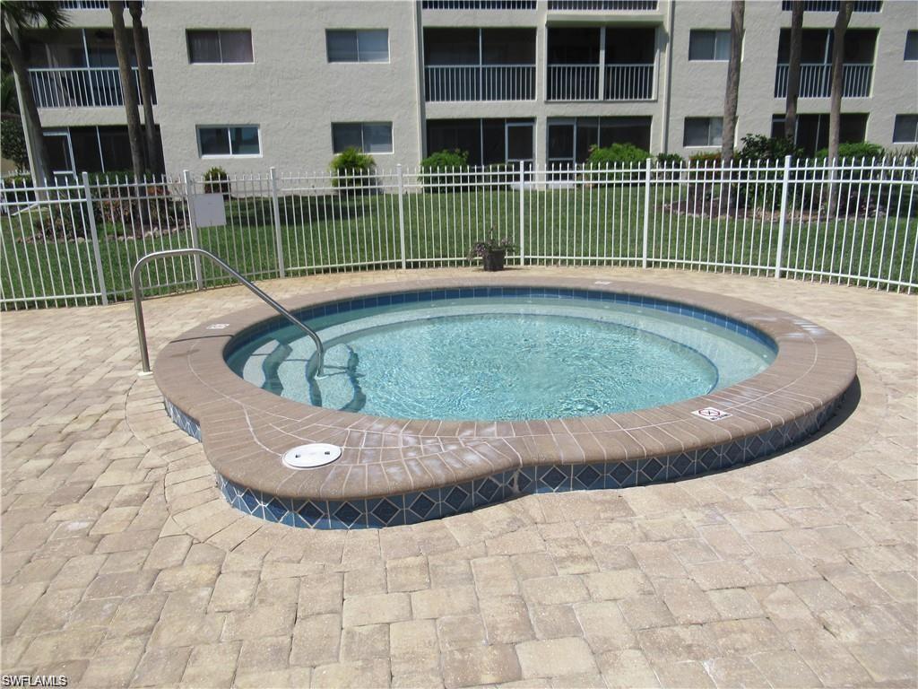 1000 Manatee Road, Unit A105 Naples, FL 34114 - Photo 19 of 22 a view of outdoor space and yard