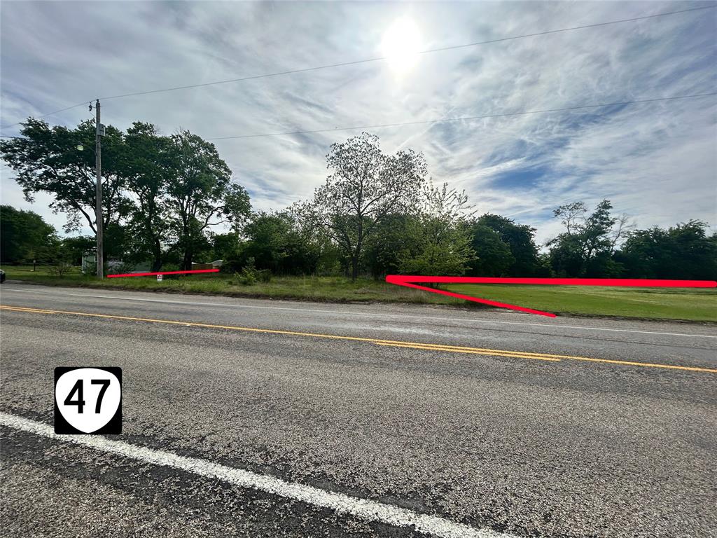 Tbd South 1st Street Point, TX 75472 - Photo 10 of 13 a view of road with grass and a small yard