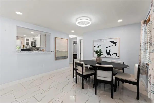 a view of a dining room with furniture