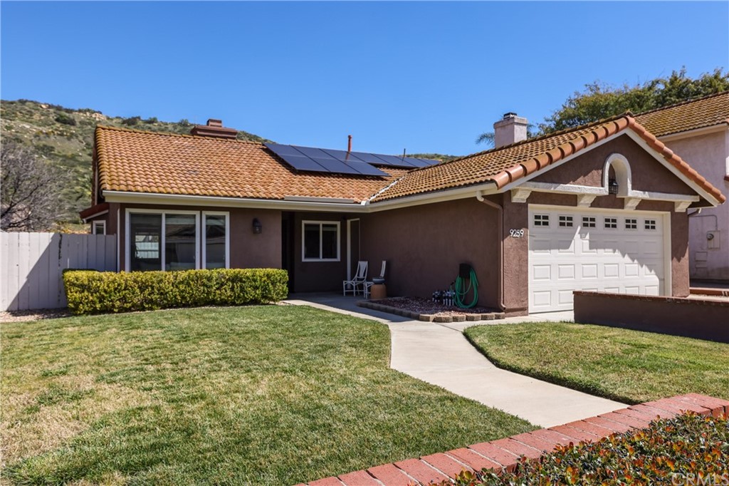 9259 Sombria Road Lakeside, CA 92040 - Photo 1 of 1 a front view of house with yard and green space