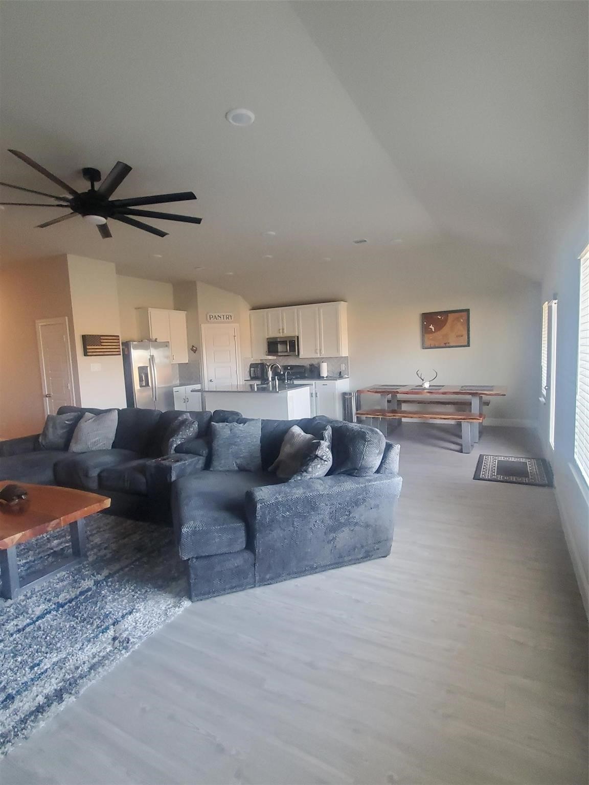 1208 Mare Stable Court Alvin, TX 77511 - Photo 12 of 19 a living room with furniture and a ceiling fan