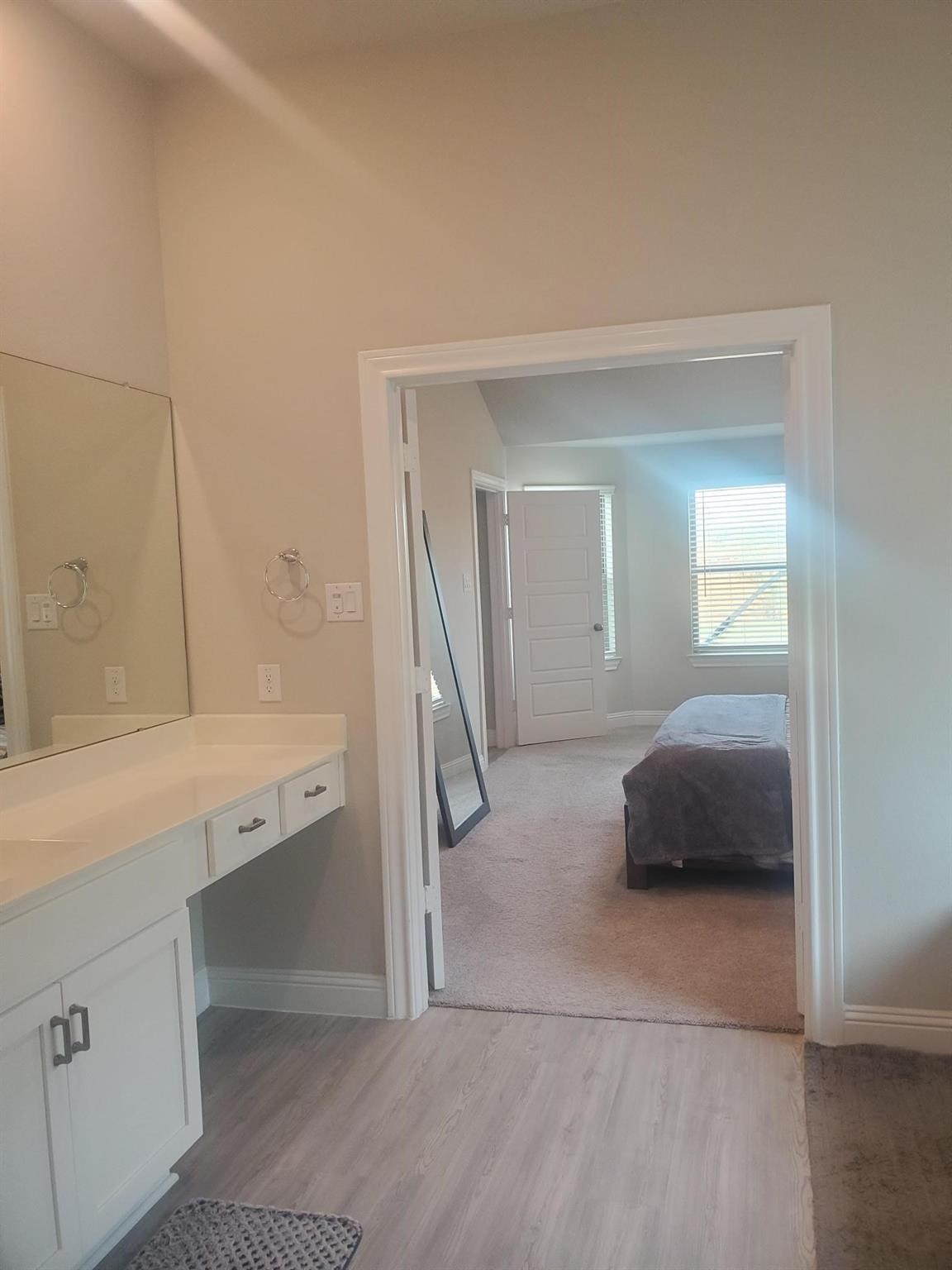 1208 Mare Stable Court Alvin, TX 77511 - Photo 10 of 19 a en suite bathroom with a granite countertop sink and a mirror