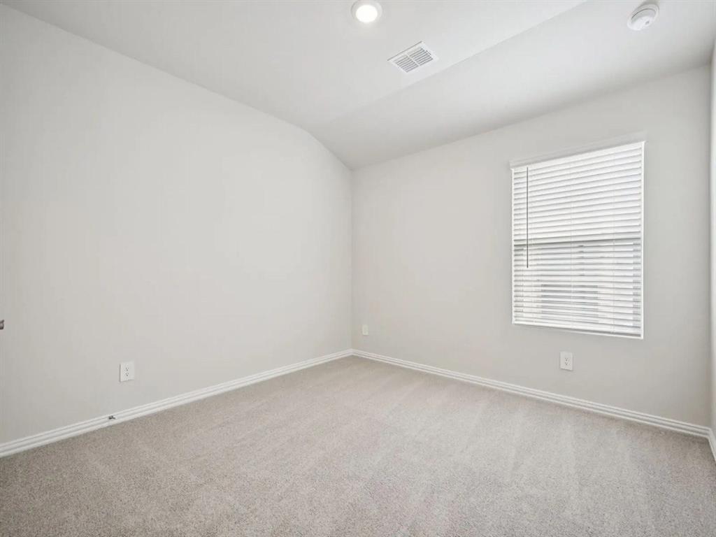 6400 Texas Ranger Trail Fort Worth, TX 76123 - Photo 11 of 14 an empty room with a window
