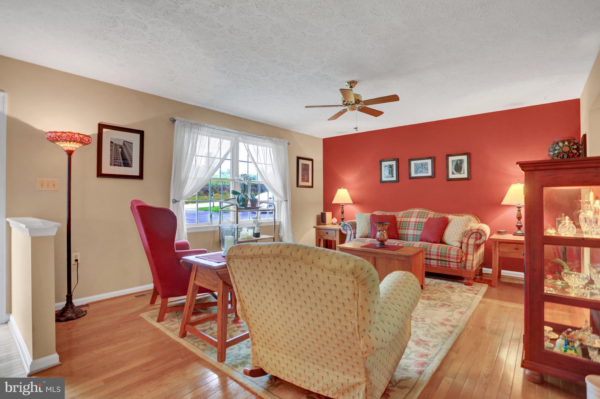 870 Bridgeton Road Fawn Grove, PA 17321 - Photo 10 of 30 GLEAMING HARDWOOD FLOORS ACCENTS LIVING ROOM