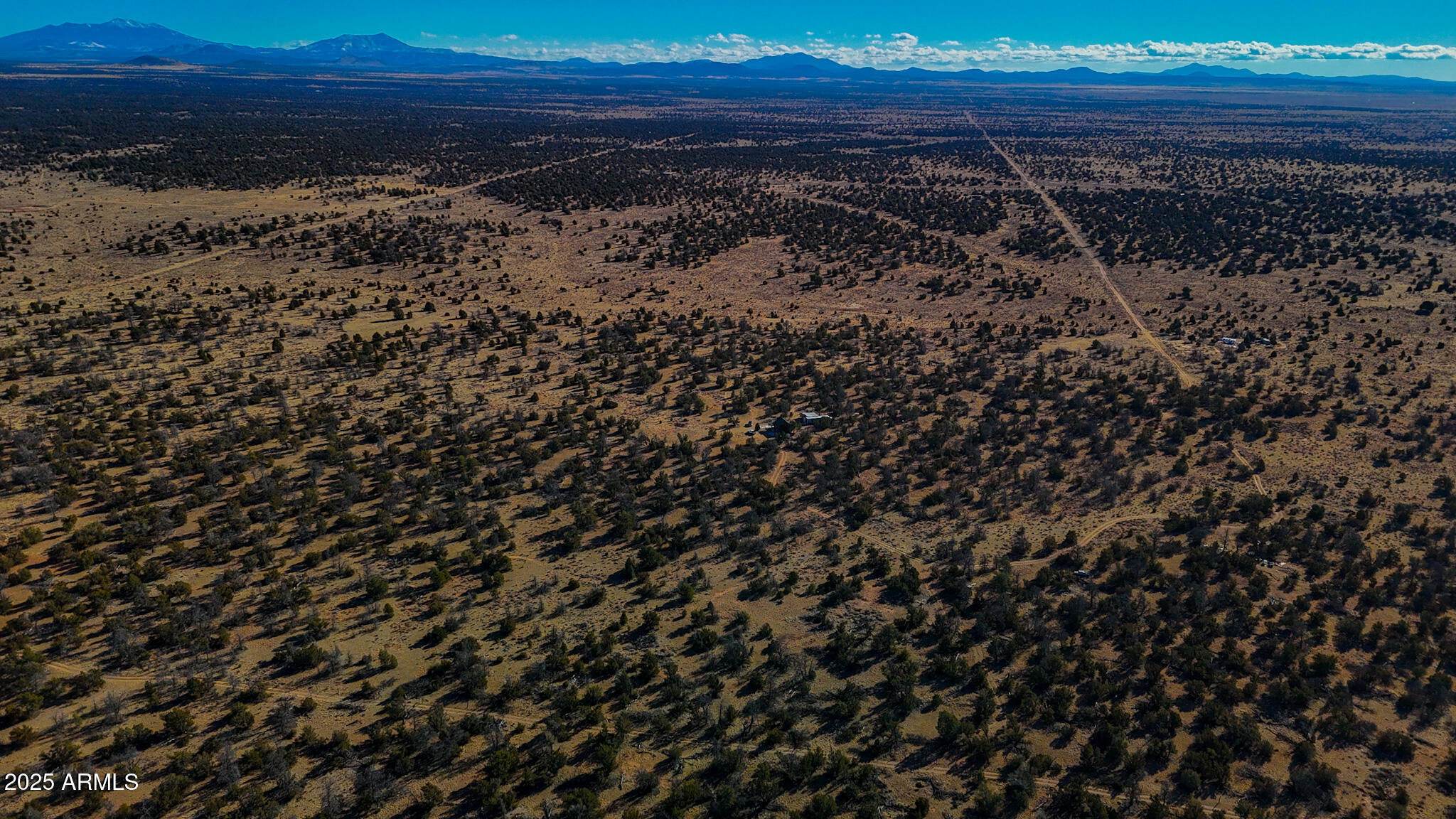 5823 North Cattle Guard Road Williams, AZ 86046 - Photo 35 of 37 a view of a backyard of a house