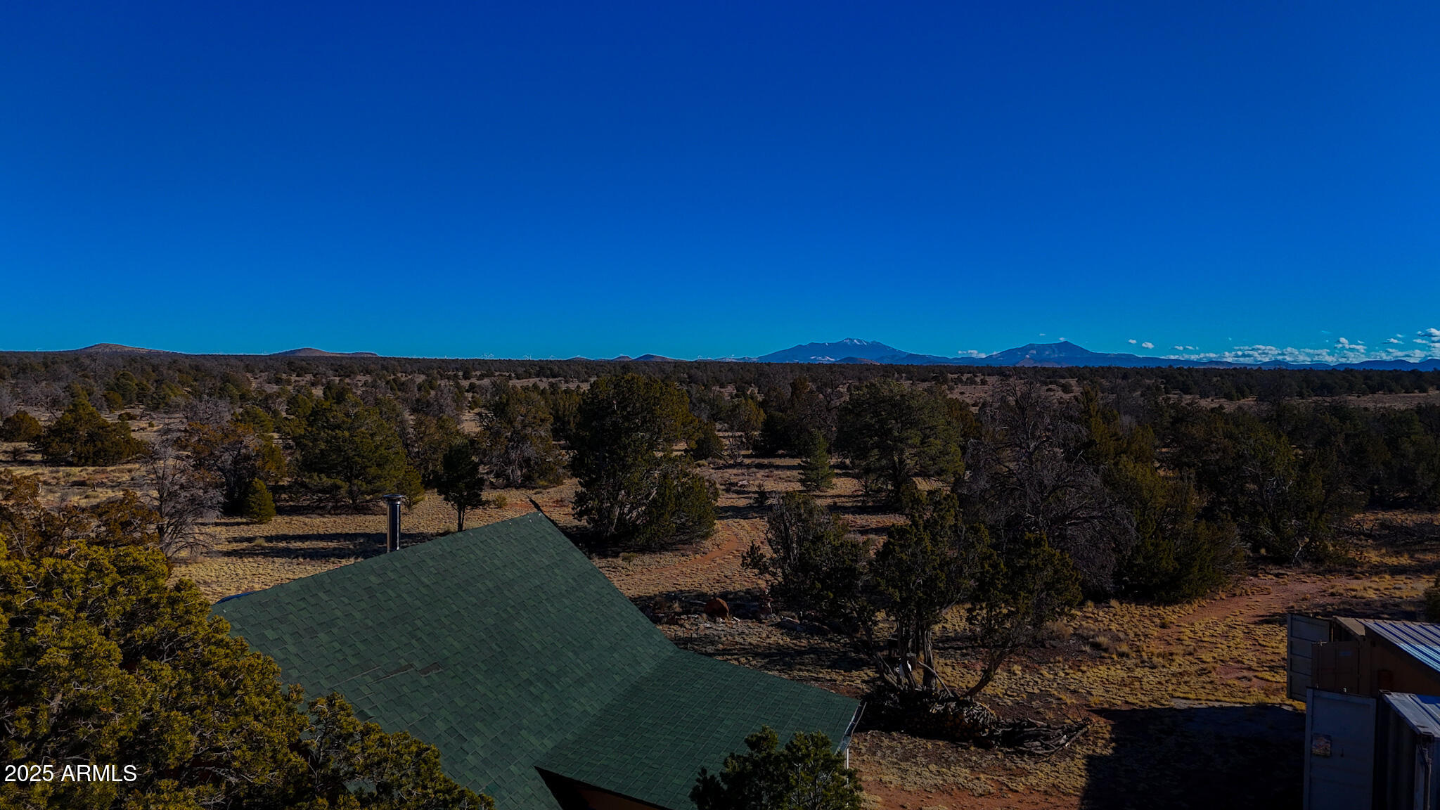 5823 North Cattle Guard Road Williams, AZ 86046 - Photo 5 of 37 a view of a sky from a balcony