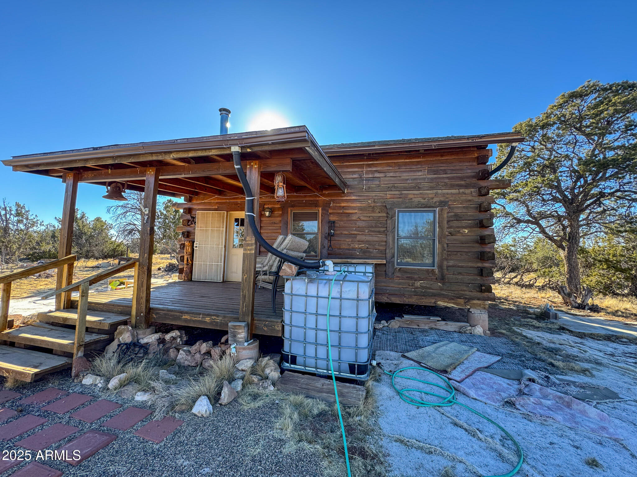 5823 North Cattle Guard Road Williams, AZ 86046 - Photo 9 of 37 a view of a chairs and table in the patio