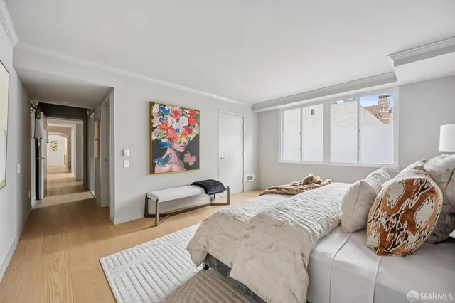 a bed room with a bed and a couch