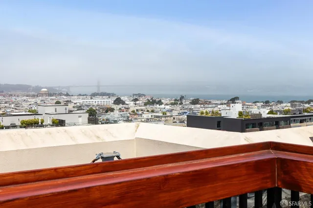 a view of swimming pool with outdoor seating
