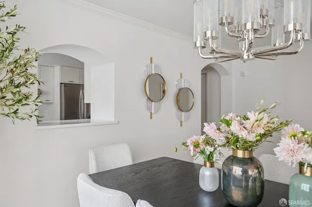 a vase of flowers sitting on a table