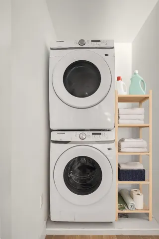 a bathroom with a sink a toilet and bathtub