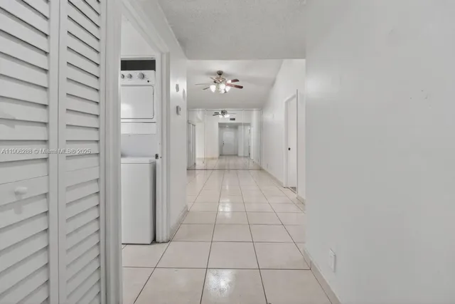 a kitchen with a refrigerator stove and cabinets