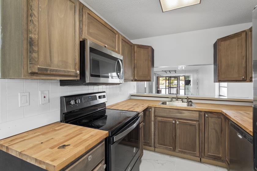 9740 West McNab Road, Unit 111 Tamarac, FL 33321 - Photo 9 of 24 IMG_3055