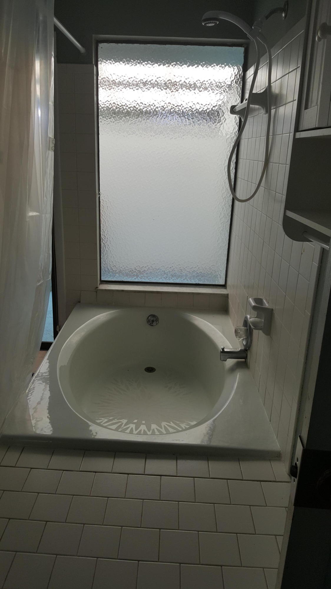 2149 Southeast Erwin Road Port St. Lucie, FL 34952 - Photo 31 of 43 a bathroom with a sink and mirror