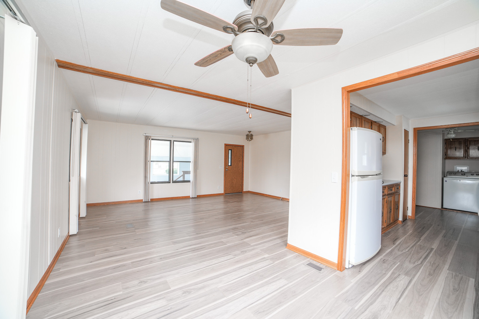 66 Maple Lane Manteno, IL 60950 - Photo 14 of 28 a view of an empty room with window and wooden floor