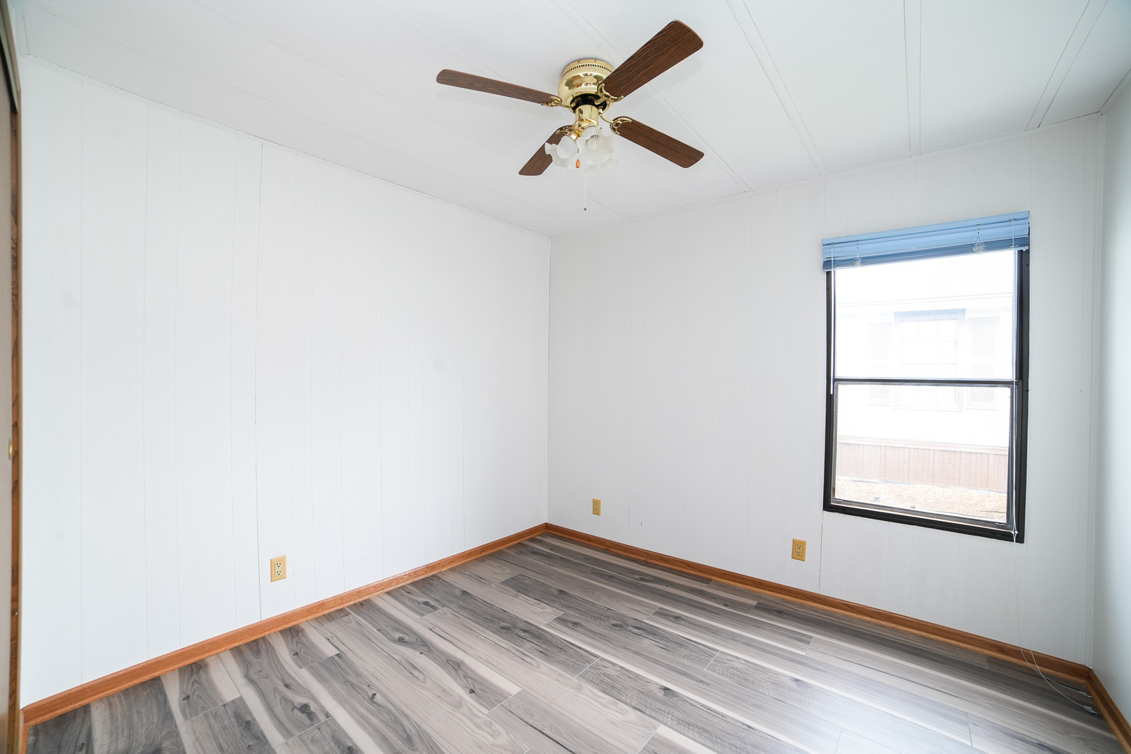 66 Maple Lane Manteno, IL 60950 - Photo 22 of 28 an empty room with a window and ceiling fan