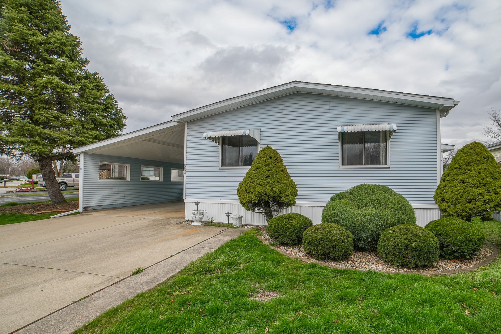66 Maple Lane Manteno, IL 60950 - Photo 3 of 28 a view of a house with a yard and large tree