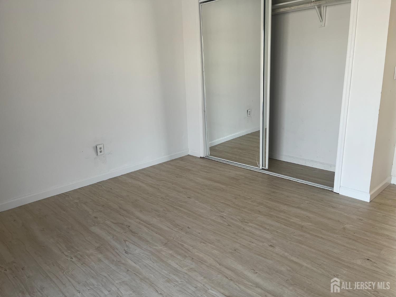 1947 Raspberry Court Edison, NJ 08817 - Photo 11 of 14 a view of an empty room