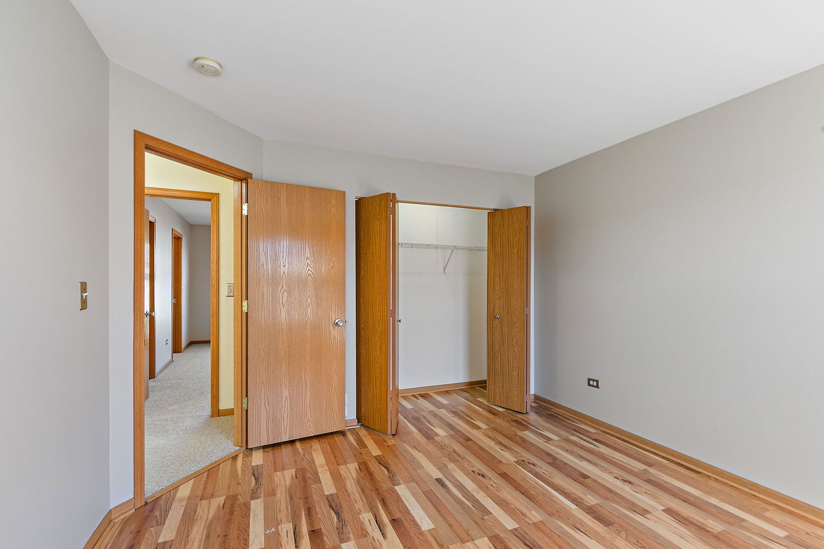 614 Littleton Trail Elgin, IL 60120 - Photo 20 of 30 a view of a room with wooden floor and bathroom