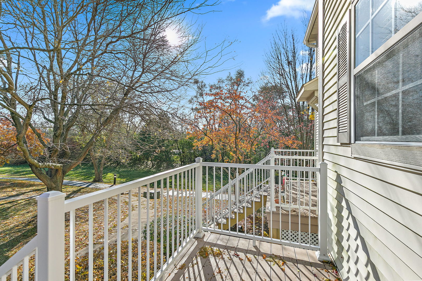 614 Littleton Trail Elgin, IL 60120 - Photo 3 of 30 a view of balcony with wooden floor and fence