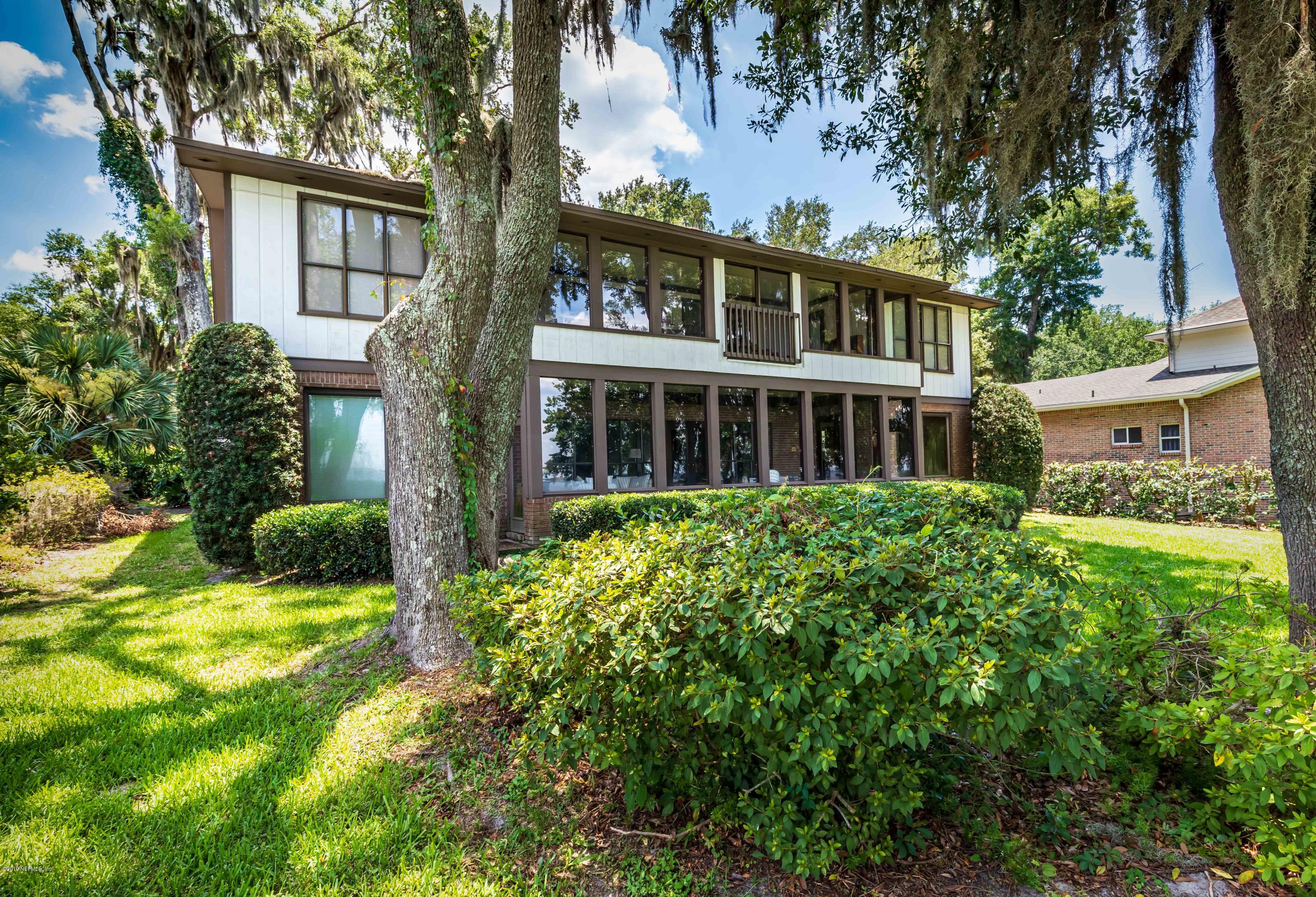 2911 Front Road Jacksonville, FL 32257 - Photo 14 of 71 front view of a house with a yard