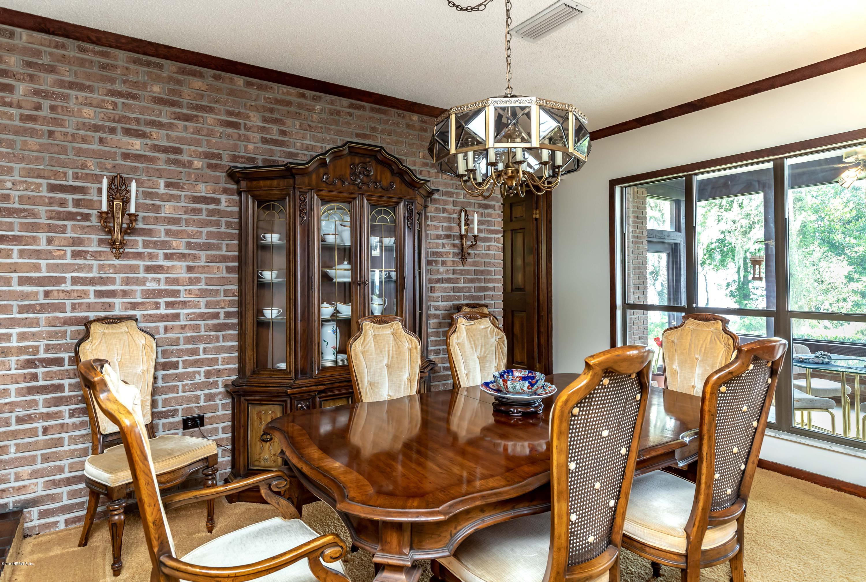 2911 Front Road Jacksonville, FL 32257 - Photo 23 of 71 a view of a dining room with furniture window and outside view