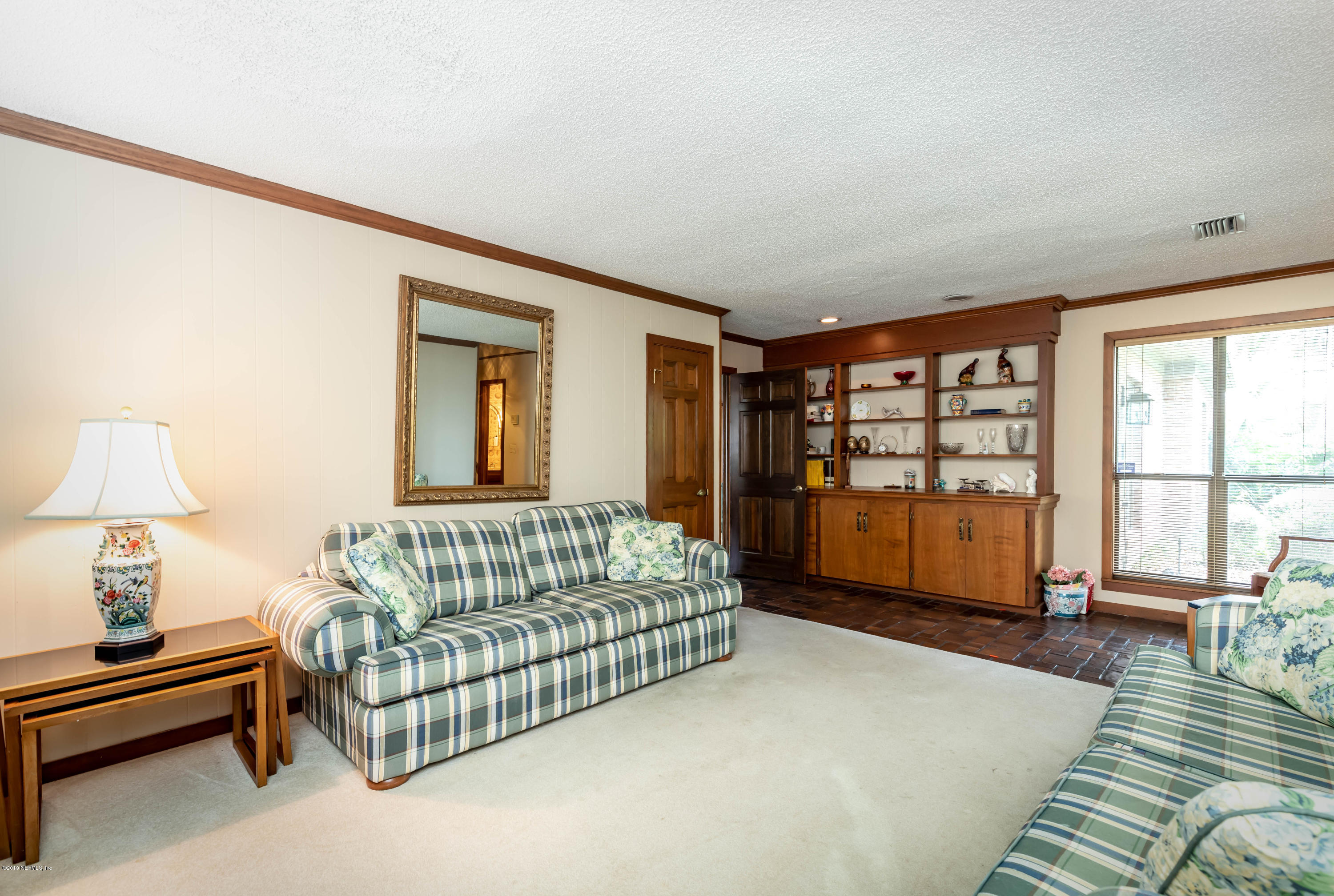 2911 Front Road Jacksonville, FL 32257 - Photo 29 of 71 a bedroom with furniture and a window