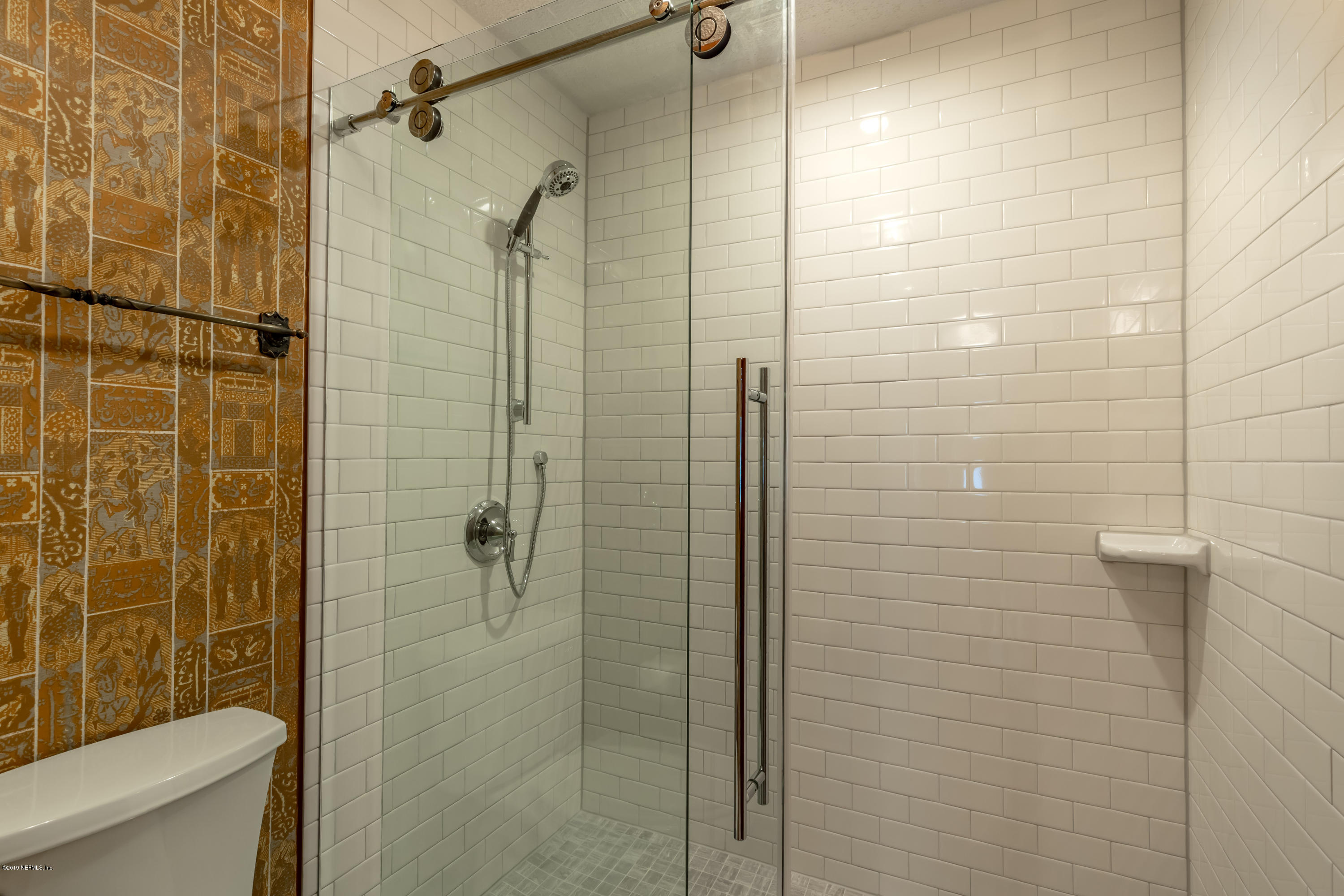 2911 Front Road Jacksonville, FL 32257 - Photo 45 of 71 a bathroom with a shower and a toilet