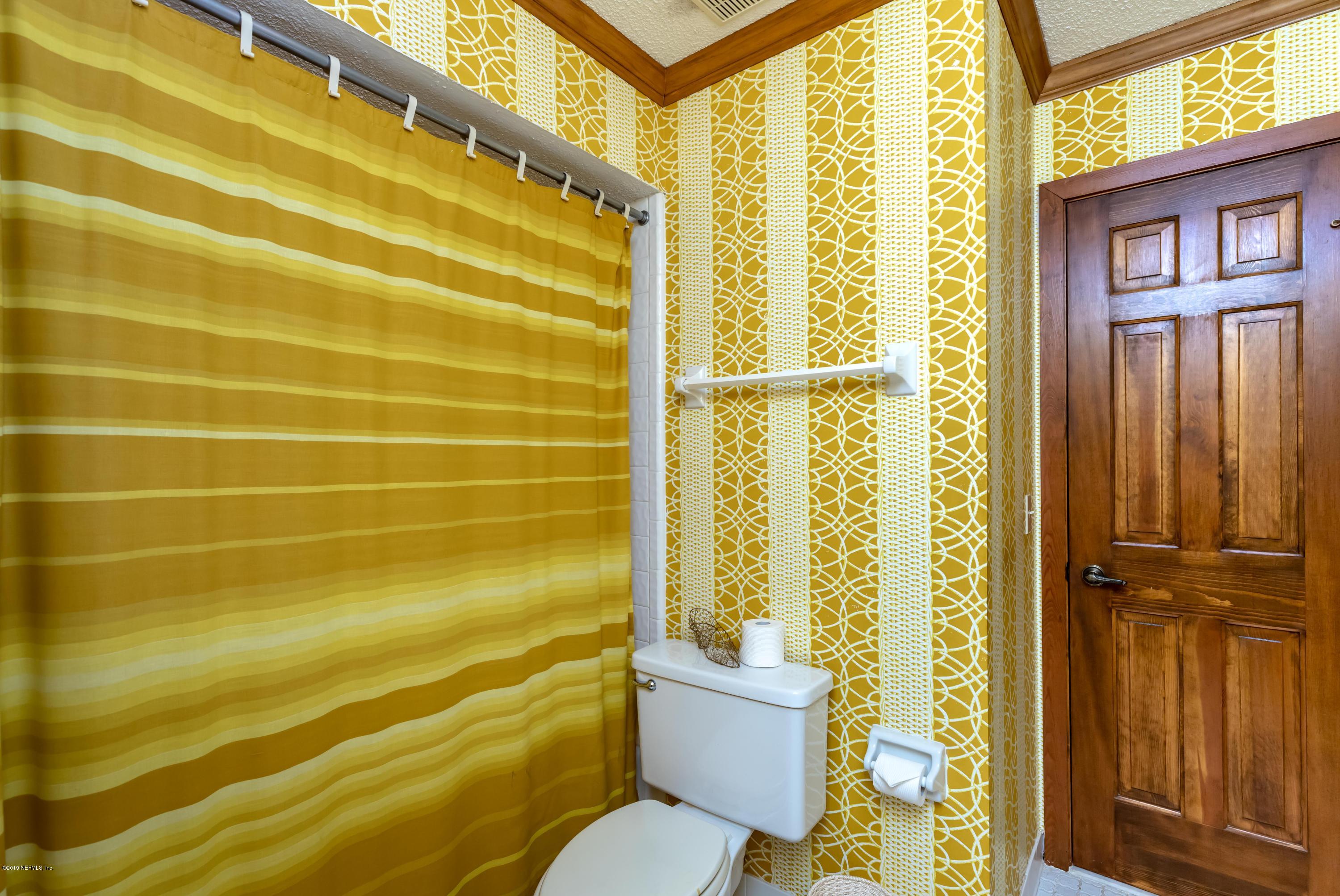 2911 Front Road Jacksonville, FL 32257 - Photo 51 of 71 a bathroom with a toilet and shower