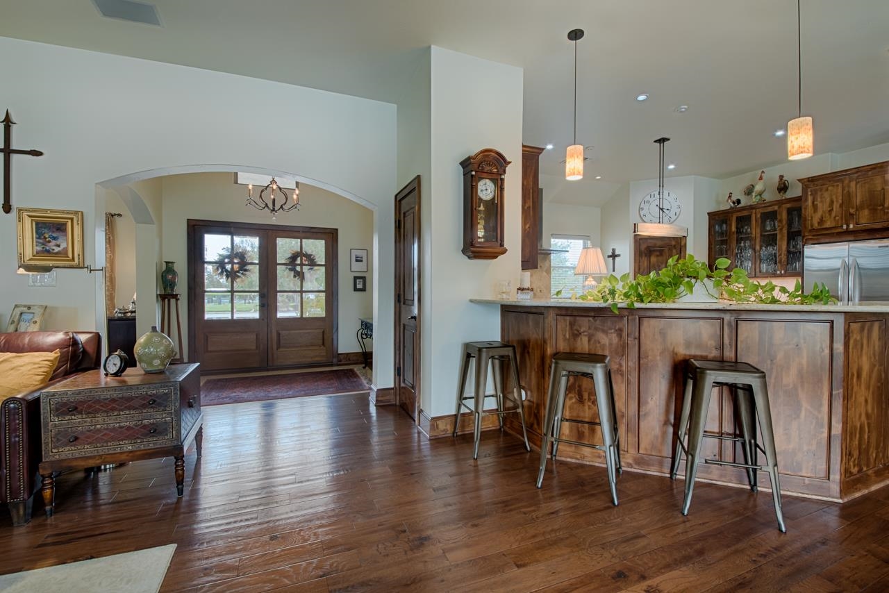 1600 Legends Parkway Kingsland, TX 78639 - Photo 3 of 30 a dining room with furniture and wooden floor