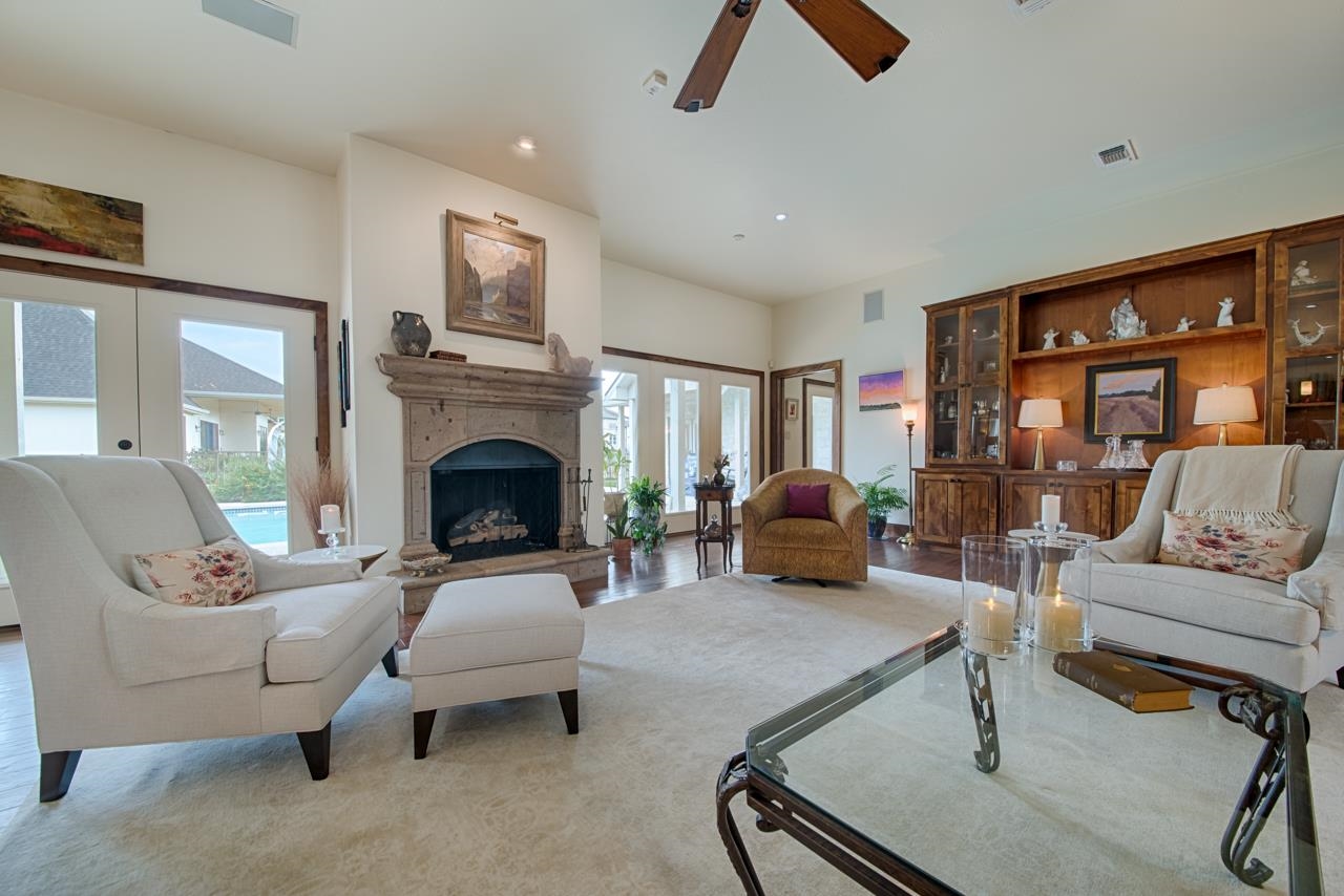1600 Legends Parkway Kingsland, TX 78639 - Photo 7 of 30 a living room with furniture or couch and a fireplace