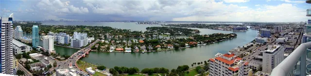a view of a lake with a mountain in the background