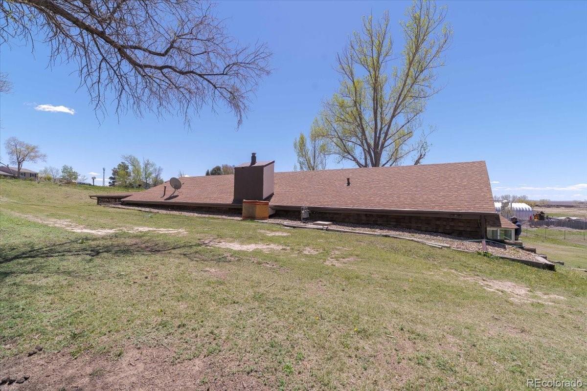 2283 Haskell Way Watkins, CO 80137 - Photo 26 of 36 a house view with a garden space