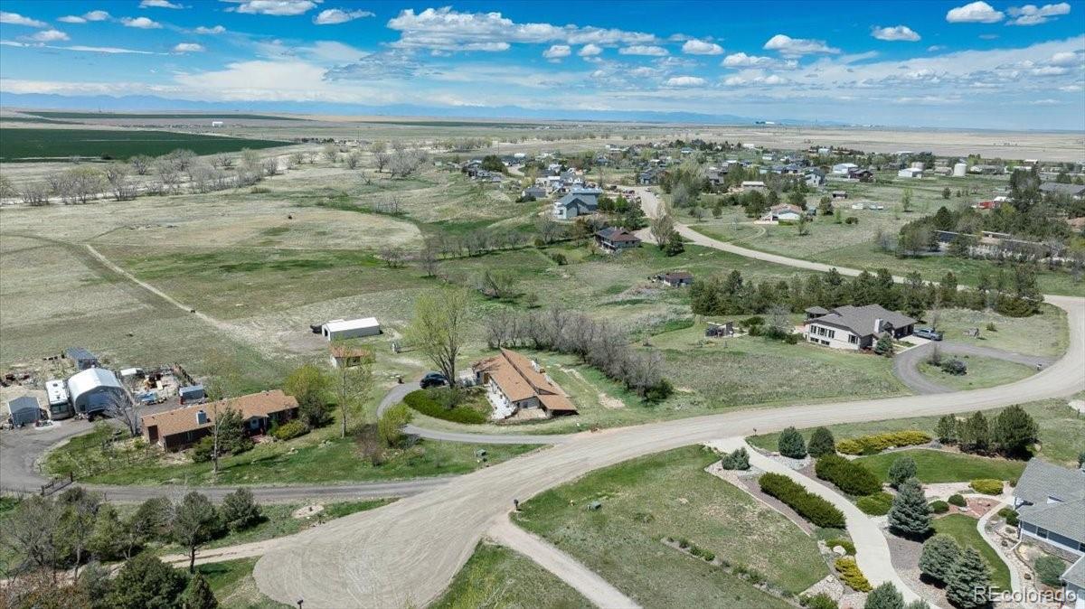 2283 Haskell Way Watkins, CO 80137 - Photo 29 of 36 an aerial view of a house with a yard